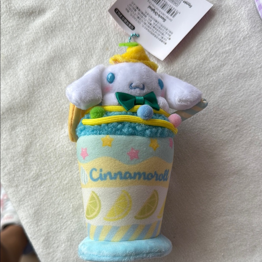 Sanrio Cinnamoroll Plush in Blue Cup with Yellow Accents